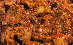 Rich Nigerian Ofada sauce with iru and assorted meat